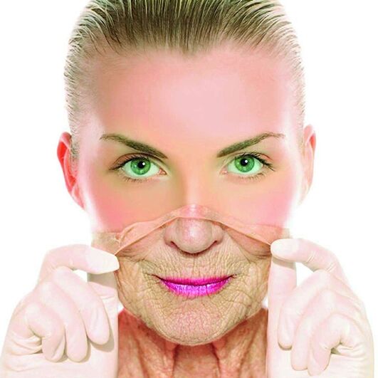 An adult woman gets rid of wrinkles on her face with home remedies